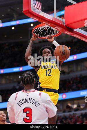 CHICAGO, IL - MARCH 05: Indiana Pacers Guard Tyrese Haliburton (0) slam  dunks during a NBA, Basketba