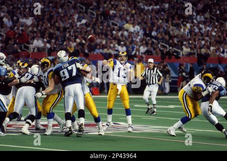 January 30, 2000: St. Louis Rams quarterback Kurt Warner #13 drops back to  pass against the Tennessee Titans in Super Bowl XXXIV (34). The Rams  defeated the Titans by the final score