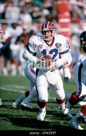 Quarterback Jim Kelly #12 of the Buffalo Bills gets the play from the  sidelines.Circa the 1980's. (Icon Sportswire via AP Images Stock Photo -  Alamy