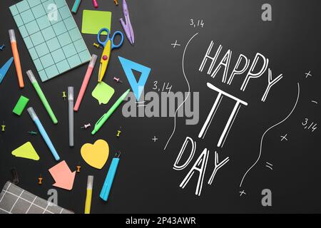 Different school stationery and text HAPPY PI DAY on black background Stock Photo