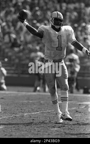 Quarterback Warren Moon #1 of the Houston Oilers looks on from the