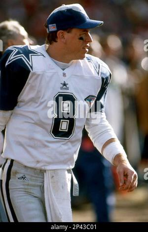 Quarterback Troy Aikman #8 of the Dallas Cowboys looks on from the
