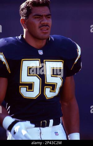 JUNIOR SEAU #55 LICENSED 8X10 COLOR NFL PHOTO SAN DIEGO CHARGERS LINEBACKER