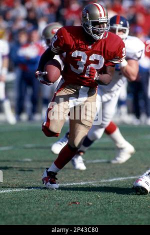 Running back Ricky Watters #32 of the San Francisco 49ers runs against the  New York Giants.Circa the 1980's. (Icon Sportswire via AP Images Stock  Photo - Alamy