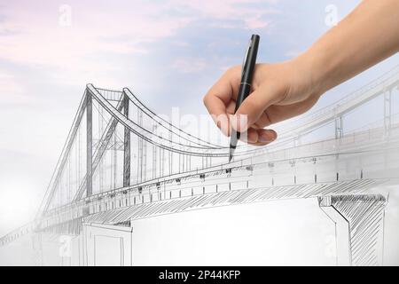 Man drawing picture of bridge, closeup. Business cooperation concept Stock Photo