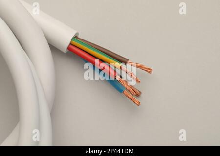 Electrical wires on light background, top view Stock Photo