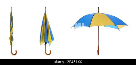 Set with stylish blue and yellow umbrellas on white background. Banner design Stock Photo