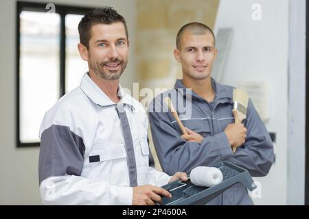 the painter with the apprentices Stock Photo