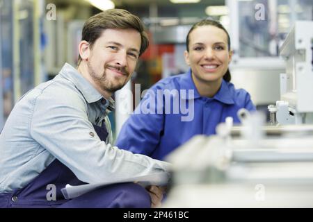 portrait of male and female industrial workers Stock Photo