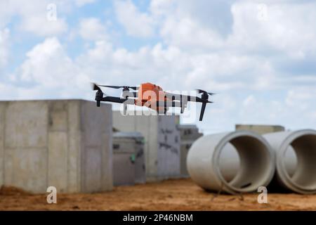 flying drone over construction site at sunny morning Stock Photo - Alamy