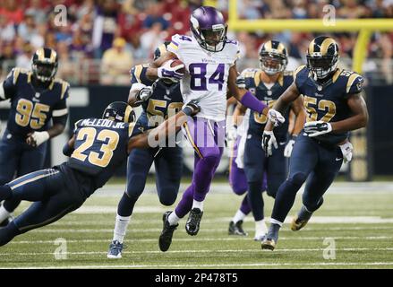 San Francisco, California, USA. 4th Dec, 2011. St. Louis Rams free safety  Quintin Mikell (27) attempts to strip ball from San Francisco 49ers tight  end Vernon Davis (85) on Sunday, December 4