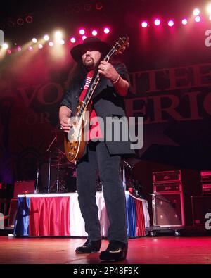 Atlanta, GA, USA. 20th Oct, 2023. Gary Rossington of Lynyrd Skynyrd performs during the Volunteers For America concert at Lakewood Amphitheatre in Atlanta, Georgia on October 20, 2001. The concert was held to raise funds to benefit the families of the victims of the September 11 (9/11) attacks on the United States of America. Additional beneficiaries of the concert include The American Red Cross, the New York City Fire Department, and the New York City Police Department. Credit: Chris Mc Kay/Media Punch/Alamy Live News Stock Photo