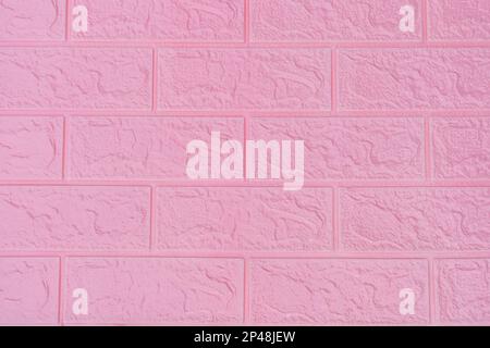 Close up of a pastel pink color brick wall texture background Stock Photo