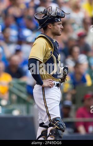 MILWAUKEE, WI - AUGUST 06: Milwaukee Brewer catcher Jonathan Lucroy signs  his retirement papers prior to a game between the Milwaukee Brewers and the  Cincinnati Reds at American Family Field on August
