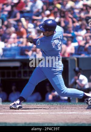 Former Kansas City Royals George Brett (C) stands near the batting cage  watching warm ups before the San Francisco Giants-Kansas City Royals game 1  of the World Series at Kaufman Stadium in