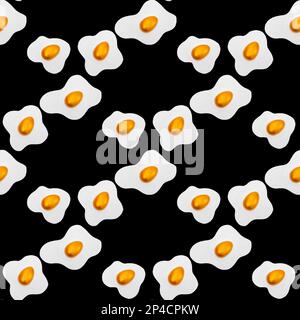 Creative layout made of scrambled eggs with decorated golden Easter eggs on a black background. Creative seamless pattern background. Spring holidays Stock Photo