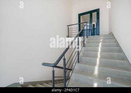 stairs  emergency and evacuation exit stair in up ladder in a new office building Stock Photo