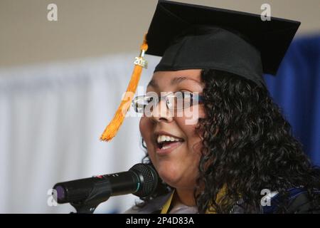 Trask High School salutatorian Mayra Isabel Robles speaks during