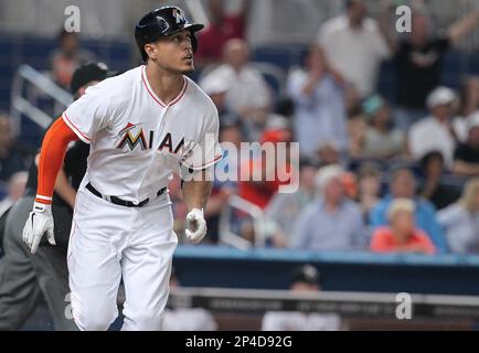 MIAMI, FL - AUGUST 14: Miami Marlins right fielder Giancarlo Stanton (27)  hits home run number 43 and becomes franchise leader during a game between  the Miami Marlins and the San Francisco