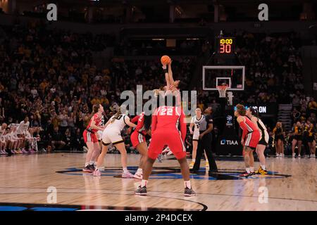 Minneapolis, Minnesota, USA. 5th Mar, 2023. Tip off of the first half of Iowa versus Ohio State on Sunday March 4th at the 2023 Big Ten Women's Basketball Tournament Championship game in Minneapolis, Minnesota. Iowa won 105-72. (Credit Image: © Steven Garcia/ZUMA Press Wire) EDITORIAL USAGE ONLY! Not for Commercial USAGE! Stock Photo