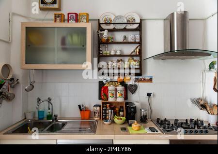 Furniture. Kitchen interior with shelves, plates and glasses. Stock Photo