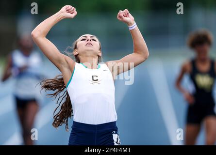 Cuthbertson s Nikolete Hurrinus celebrates her Girls 400 Meter