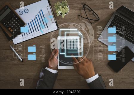 IT working on computer Business processes Document Management System (DMS) progress planning and chart Stock Photo