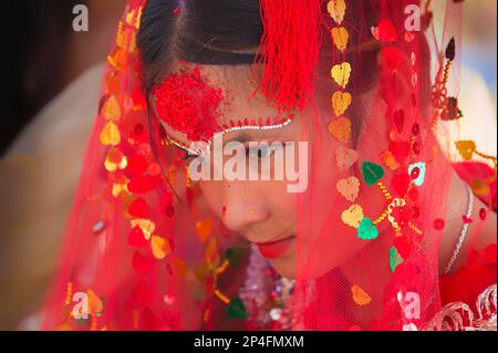 Nepalese bride from the Tharu ethnic group in traditional dress