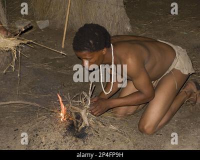 The Bushmen are the oldest inhabitants of southern Africa, here you light a fire with two sticks Stock Photo