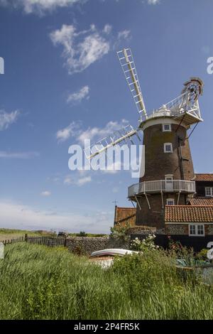Cley Windmill dates from the early 18th Century and is a well-known landmark on the north Norfolk coast. It commands breathtaking views over the salt Stock Photo