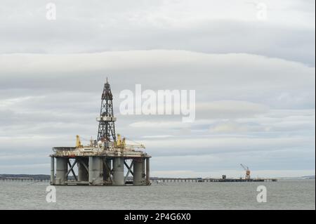 Oil rig moored in sea near coast, Cromarty Firth, Moray Firth, Invergordon, Easter Ross, Scotland, United Kingdom Stock Photo