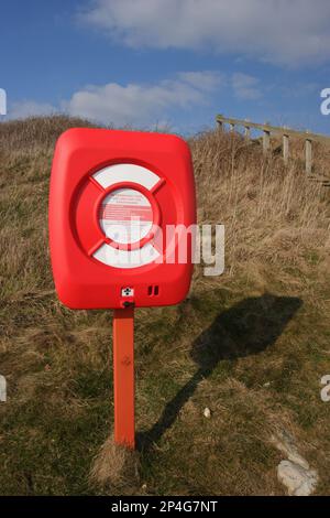 Lifebuoy in container on beach, Ringstead Bay, Dorset, England, United Kingdom Stock Photo