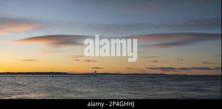 Seascape during dramatic stormy sunset-panorama Stock Photo