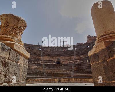 Bosra, Syria - 04 17 2011: ancient and historic roman amphitheater of Bosra in Syria. Stock Photo