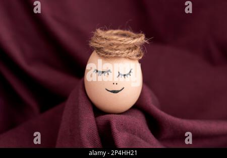 cute sleeping easter chicken egg in middle of tulip petals flowers  Stock Photo