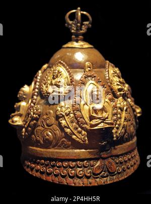 Priest Helmet,worn by a Vajracharya priest during rituals.Nepal.17th century.Gilded bronze. Stock Photo
