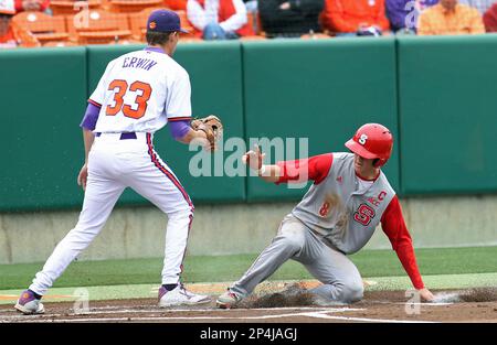 North Carolina State's Trea Turner (8) throws to first for the