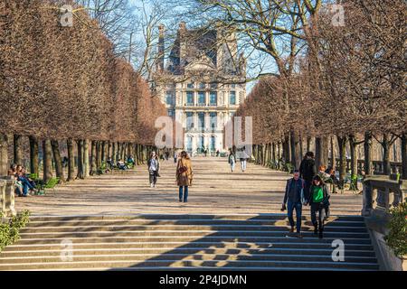 People enjoying the early Spring sunshine in the Tuileries Garden, Paris, France. Stock Photo