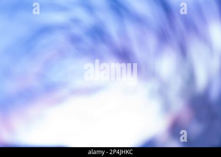 Winter seasonal snow bokeh background. Blue snow bokeh light backgrounds. Stock Photo