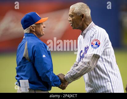 Former Montreal Expos Darren Fletcher, Larry Walker, manager Felipe alou  and Denis Boucher, left to right, line up as members of the 1994 team are  introduced prior to a pre-season game with