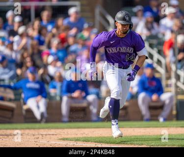 Colorado Rockies shortstop Ezequiel Tovar (14) attempts to leg out an infield hit during a MLB spring training game vs the Chicago Cubs Sunday, March 5, 2023, in Scottsdale, AZ. Chicago Cubs defeated the Colorado Rockies 6-5 (Marcus Wilkins/Image of Sport) Stock Photo