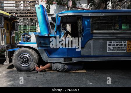 Manila, Manila, The Philippines. 6th Mar, 2023. A driver repairs his jeepney in downtown Manila, amid the nationwide 7-day strike against the government's transport modernisation programme which aims to replace old vehicles. Credit: ZUMA Press, Inc. Credit: ZUMA Press, Inc./Alamy Live News Stock Photo