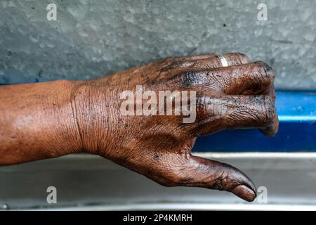 Manila, Manila, The Philippines. 6th Mar, 2023. The hand of a driver repairing his jeepney is covered with diesel in downtown Manila, amid the nationwide 7-day strike against the government's transport modernisation programme which aims to replace old vehicles. Credit: ZUMA Press, Inc. Credit: ZUMA Press, Inc./Alamy Live News Stock Photo