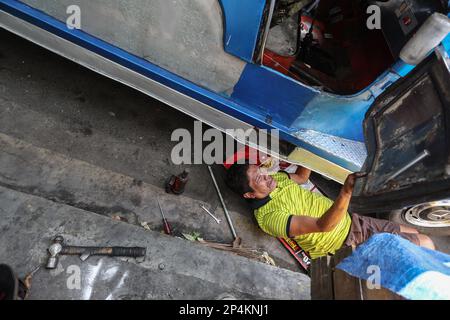 Manila, Manila, The Philippines. 6th Mar, 2023. A driver repairs his jeepney in downtown Manila, amid the nationwide 7-day strike against the government's transport modernisation programme which aims to replace old vehicles. Credit: ZUMA Press, Inc. Credit: ZUMA Press, Inc./Alamy Live News Stock Photo