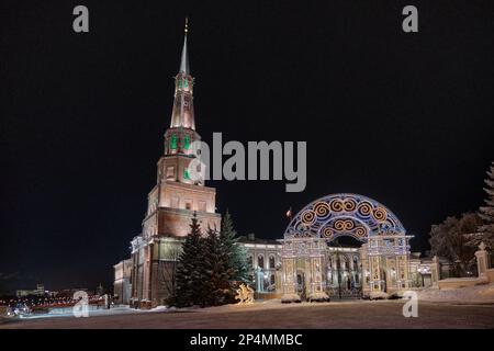 Leaning Suyumbike tower with muslim crescent in the Kazan Kremlin. Architectural symbol of Kazan, Russia. Historical monument. Festive evening illumin Stock Photo