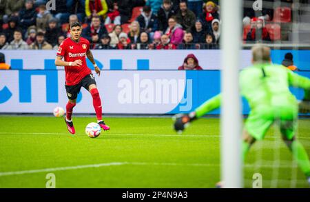 Leverkusen, Germany. 5th Mar, 2023.  Piero Hincapie (Leverkusen), Torwart Oliver Christensen (Hertha) Bayer Leverkusen - Hertha BSC Berlin Bundesliga Stock Photo