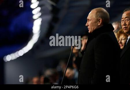 Russian President Vladimir Putin, right, declares the 2014 Winter Olympics open as United Nations Secretary-General Ban Ki-moon, right, looks on during the opening ceremony, Friday, Feb. 7, 2014, in Sochi, Russia. (AP Photo/David Goldman, Pool)