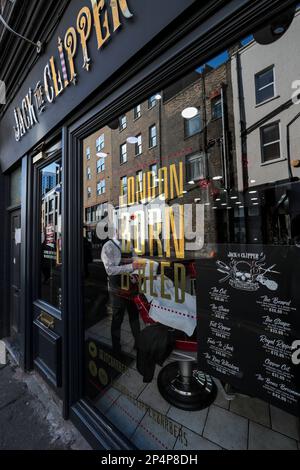 Jack the Clipper barbers shop, Toynbee Street, London E1 Stock Photo