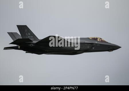 RAF Valley, Holyhead, Wales on March 2 2023. US Air Force F-35A Stealth aircraft flying Stock Photo