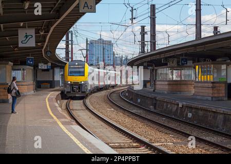 Brussels, Belgium - July 02 2019: Desiro Siemens train opetated by the SNCB arriving at the Brussels-South railway station (French: Gare de Bruxelles- Stock Photo